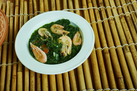 Sangah - food made with maize, cassava leaf, and palm nut juice in Cameroonian cuisine