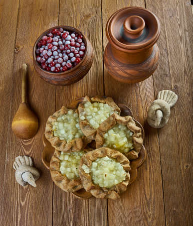 Karelian pasty with berries - traditional pasties usually had a rye crust, but the North Karelian and Ladoga Karelianの写真素材