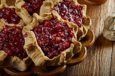 Karelian pasty with berries - traditional pasties usually had a rye crust, but the North Karelian and Ladoga Karelianの写真素材