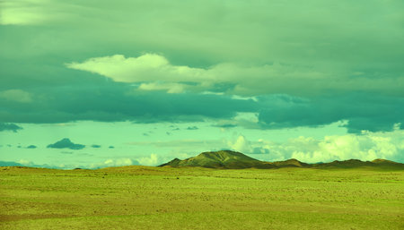 Mongolia. Sands Mongol Els dunes . Herds graze in the spring green valleyの写真素材