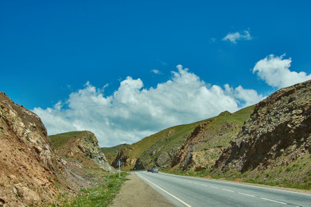The road towards the city of Naryn in western Kyrgyzstanの写真素材