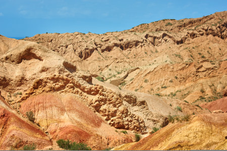 Fairy Tale Canyon, rock formations on the Issyk-Kul lake. Kyrgyzstan Central Asia