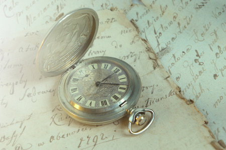 Old-time watch, current of time, handwritten documents, historyの写真素材