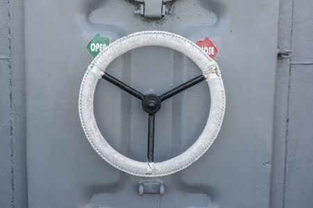 Circle safty Door handles on the battleshipの写真素材