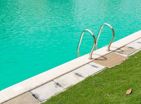 Stainless steel Stairs down to the pool,Pool handrails side of swimming pool .