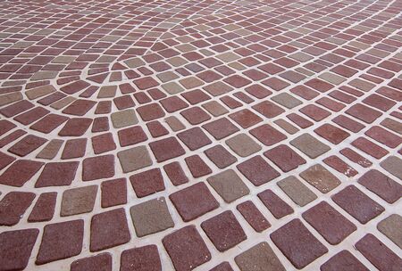 Beautiful color of tile on the walkway.;