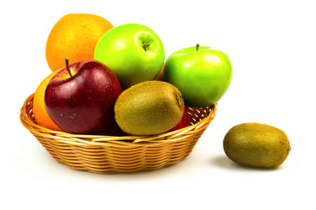Mix fruit in basket on white back ground and isolatedの写真素材