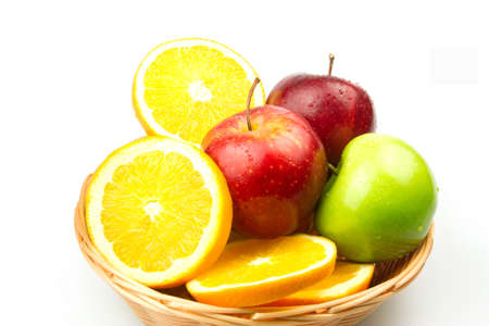 Mix fruit in basket on white back ground and isolatedの写真素材