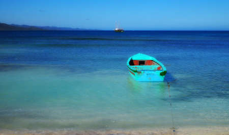 A colorful small boat in Caribbean sea 