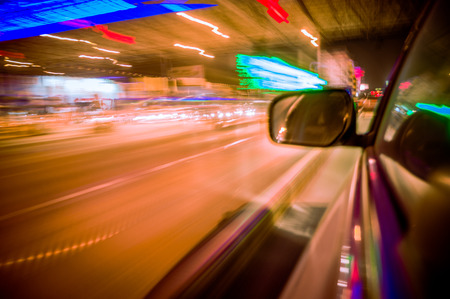 City road running fast on the night of vehicles