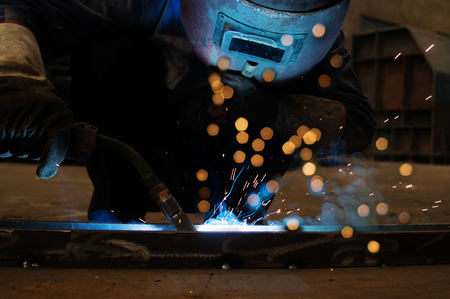 Welders working when intense light emitted by the virtualized become beautiful aperture