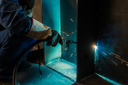 Welding work issued strong dazzling rays of lightの写真素材