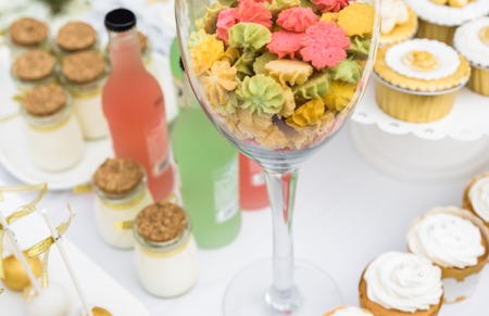 Colourful biscuits and pastries on the tableの写真素材