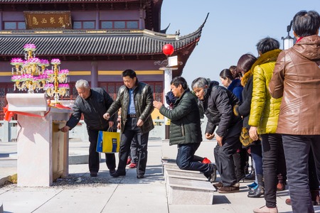 JIANGYIN, China in 2015 February 19: people burn incense at the first day of the Chinese new year to the temple to burn incense and pray, the year of the sheep, in February 19, began.のeditorial素材