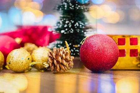 Christmas gift box with Christmas decorations and snow conesの写真素材