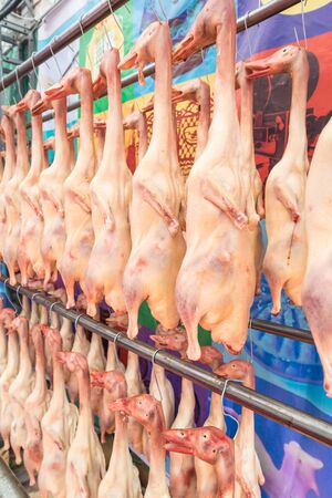 Raw fresh organic chicken for sale at asian food marketの写真素材