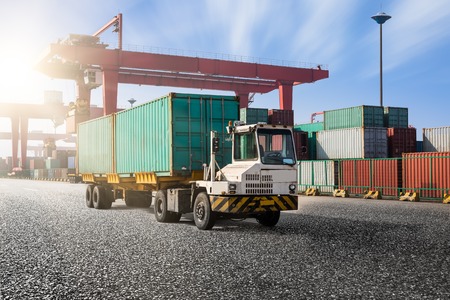 Highway bridge and truck transport container on the road to the port.のeditorial素材