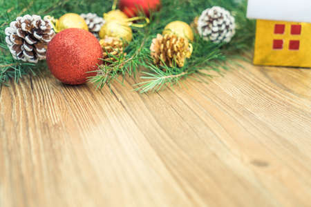 Christmas fir tree on wooden board backgroundの写真素材