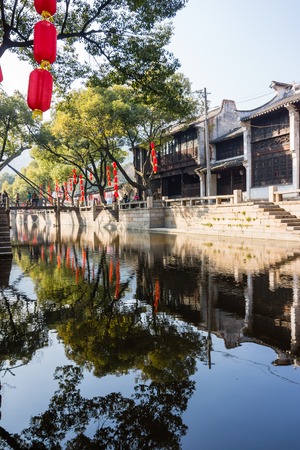 October 2, 2014, National Day holiday. Tourists from the ancient town of Xitang, Zhejiang Province, are sitting on a boat trip.のeditorial素材