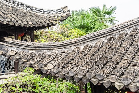 Old Chinese Roofs in rural China at dawnの写真素材