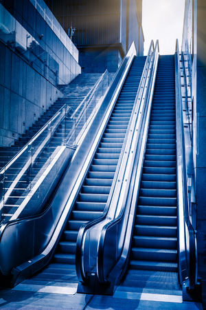 modern architecturel - the escalator moving upwards