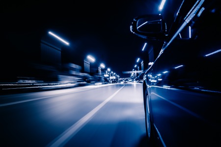 View from Side of Car Going Around Corner, Blurred Motionの写真素材