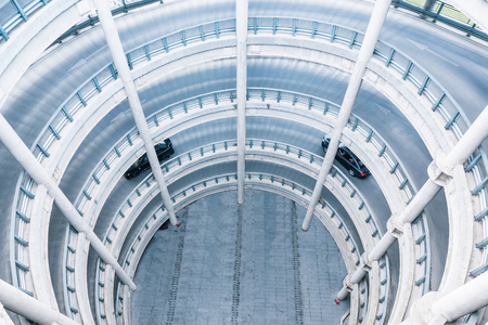Car driving in multi storey car park.の写真素材