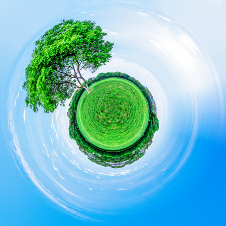 green with little planet effect,Green planet, conceptual artwork.の写真素材