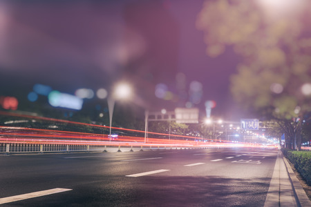 blurred traffic light trails on road in Beijing,China.