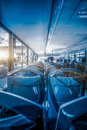Close-Up Of Empty Seats Of Bus in blue tone.のeditorial素材