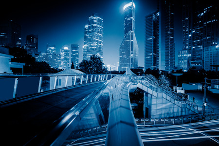 footbridge with cityscape at night in Shanghai,China.のeditorial素材
