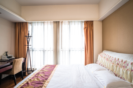 Empty hotel bedroom in city of China.のeditorial素材