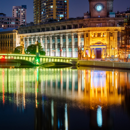 Illuminated City At Waterfront in Shanghai,China.のeditorial素材