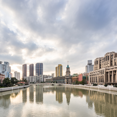River And Modern Buildings Against Sky in Shanghai,China.の写真素材