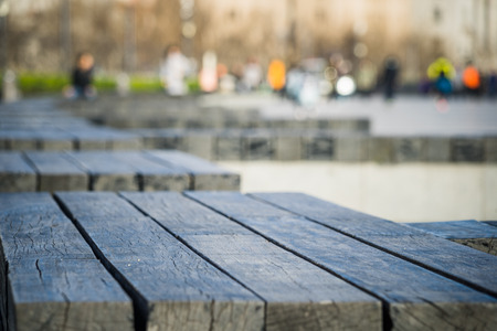 empty bench on pavement in city of China.の写真素材