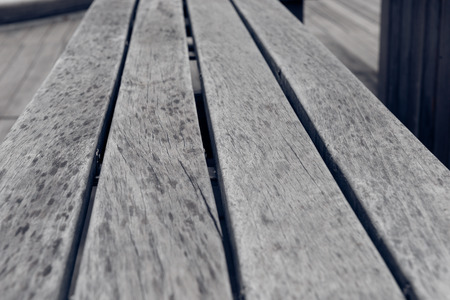 empty bench on pavement in city of China.の写真素材