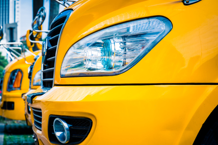 Yellow school bus ,Line of school buses.のeditorial素材