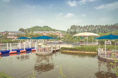 pavilion in the river of a natural park,shot in Shanghai,China.