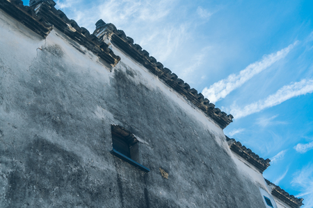 roof of historic building against blue sky,shot in Lishui,China.の写真素材