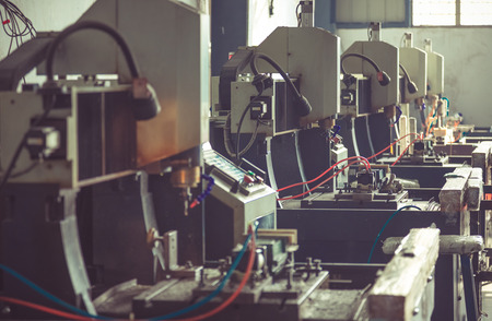 Industrial machine in the factory at metalworks,side view.の写真素材