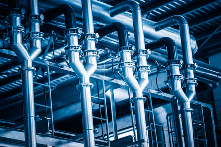 steel pipelines and cables in a plant,Industrial zone.