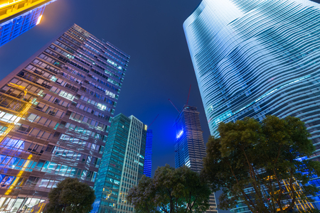 Skyscrapers from a low angle view at night in Shanghai,China.の写真素材