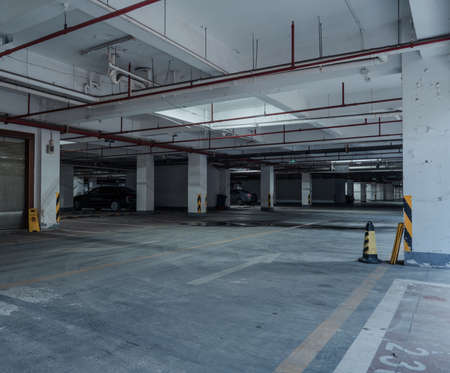 old parking lot with lighting, concrete buildingのeditorial素材