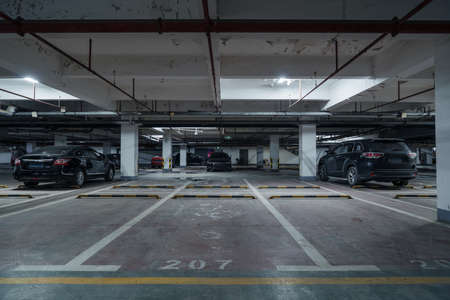 old parking lot with lighting, concrete buildingのeditorial素材