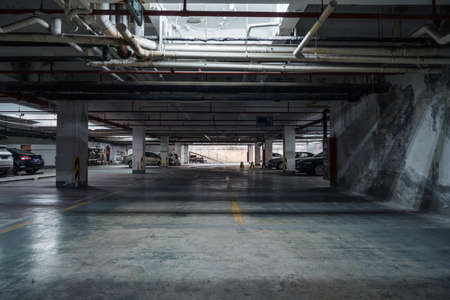 old parking lot with lighting, concrete buildingのeditorial素材