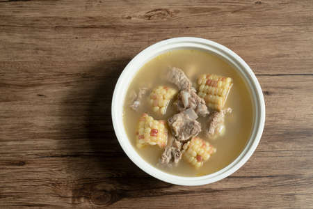 Corn and pork bone soup, delicious Chinese food. The decorations on the dining table.の写真素材