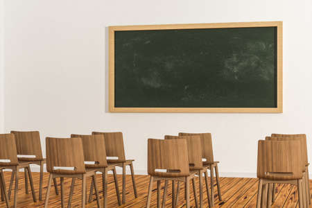 A classroom with chairs inside and a blackboard in the front of the room, 3d rendering. Computer digital drawing.の写真素材