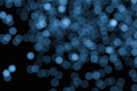 Floating specks of light on black background, 3d rendering. Computer digital drawing.