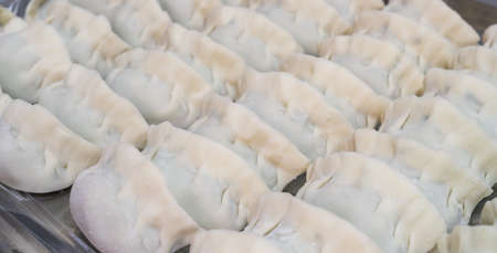 Different flavors of homemade dumplingsの写真素材