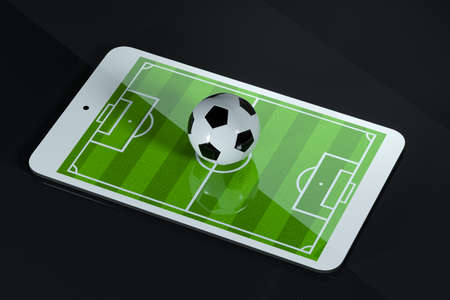 Tablet with football game on dark background, 3d rendering. Computer digital drawing.の写真素材